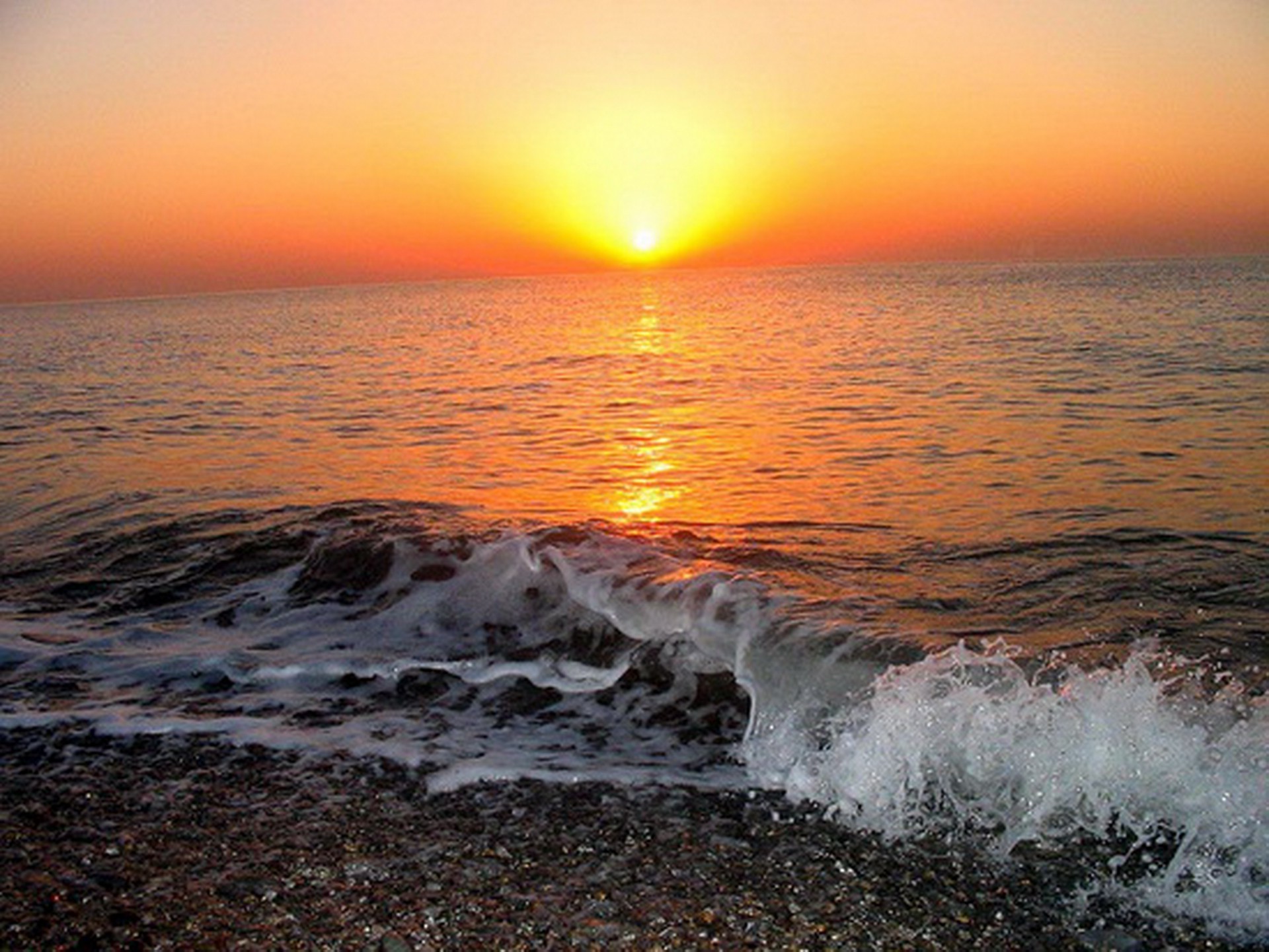 the sunset and sunrise sunset water dawn ocean evening sea beach surf sun dusk seashore seascape landscape wave