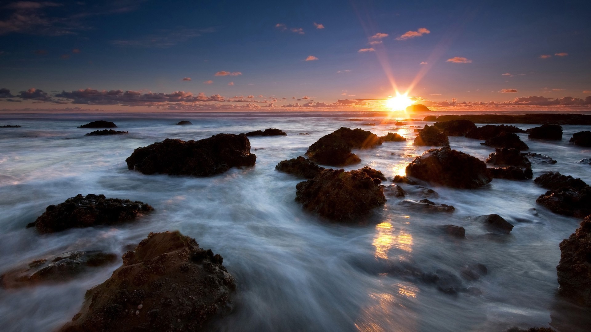 the sunset and sunrise sunset water dawn dusk evening sun beach ocean sea seascape sky seashore surf landscape