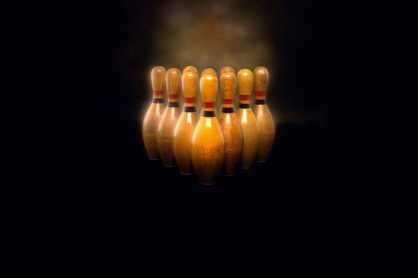 Bowling. Skittles. Dark background. Sport. Strike