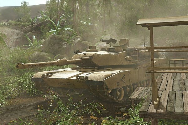 A military tank makes its way through the jungle