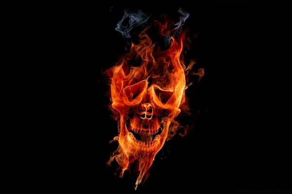 A skull made of fire and smoke on a black background