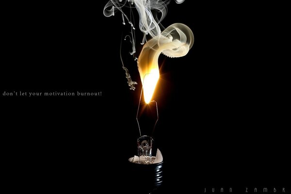 Smoke and fire from a broken light bulb