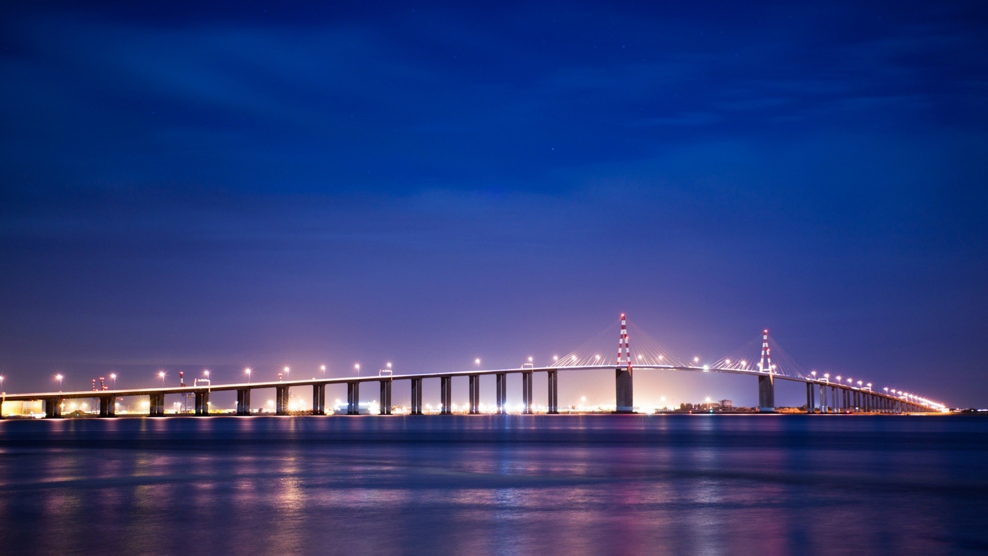 bridges water bridge sunset dusk architecture sky river reflection evening city travel dawn downtown light pier suspension bridge