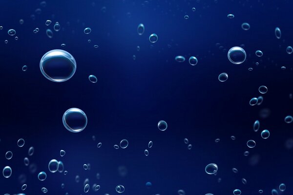 Bulles d air dans l eau bleue