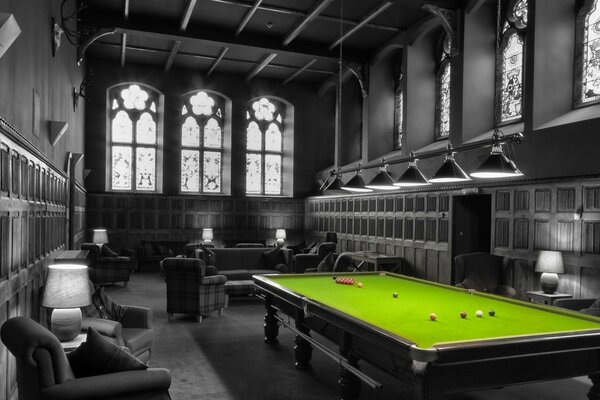 Billiard table in a gray room