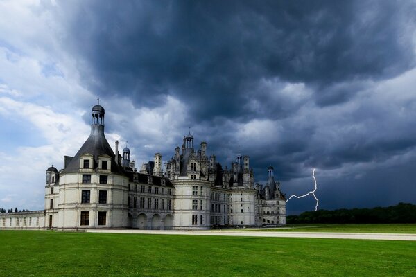 Thunderstorm over the castle. Lightning discharge