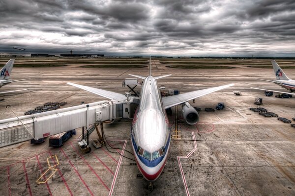 Surreal planes at the airport under the clouds