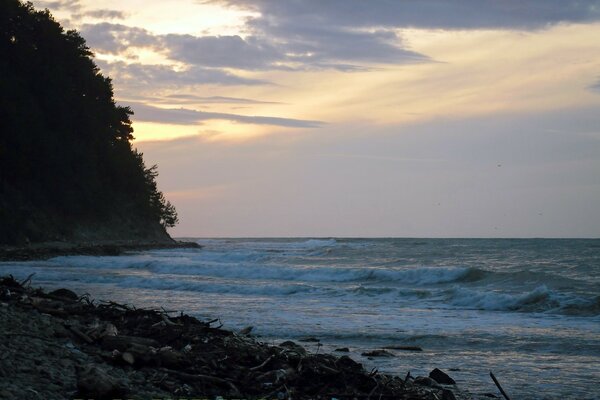 Evening sunset in the bay of the sea