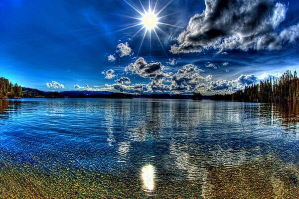 Contrasting landscape of the lake at sunset