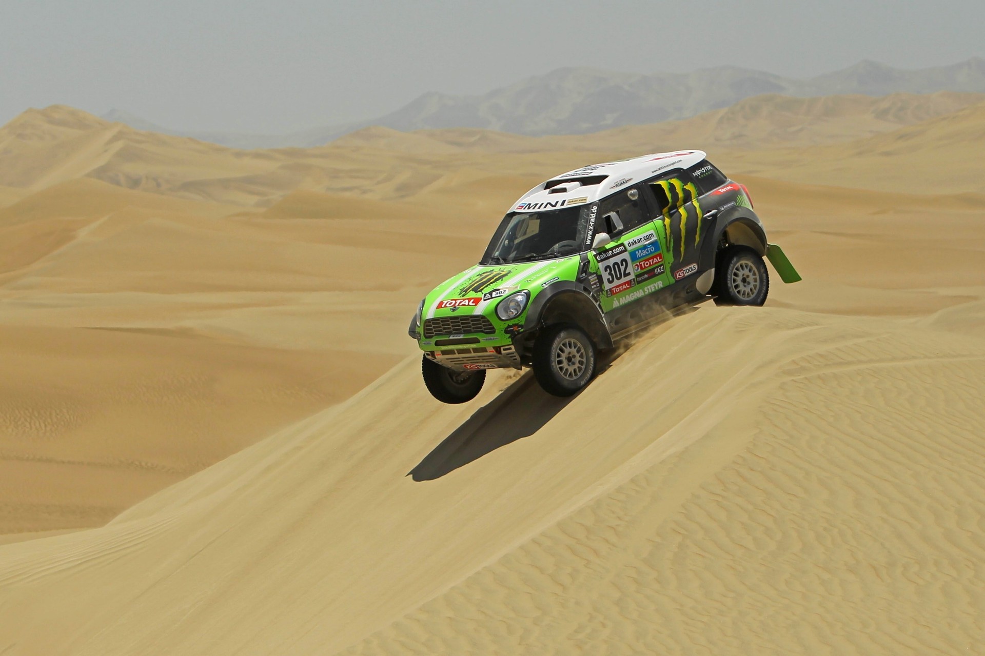 rally cars desert sand adventure landscape competition terrain dry arid vehicle travel hill barren road