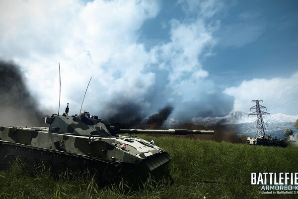 Shooting tanks on a green meadow