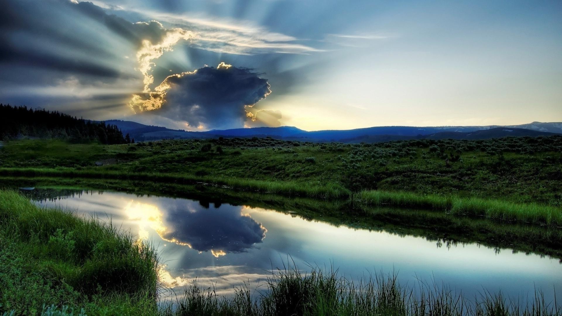 the sky landscape dawn nature sunset sky lake water outdoors sun reflection grass fair weather summer