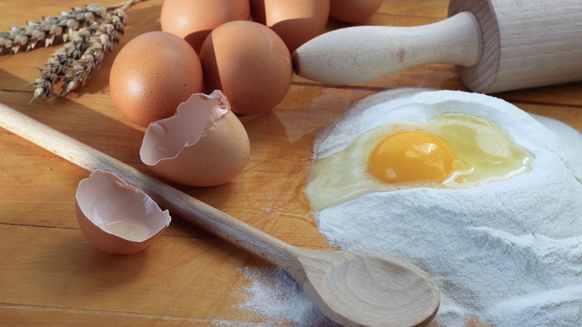 breakfast egg flour cooking wood food egg yolk baking wooden table ingredients homemade preparation nutrition dough traditional rustic cholesterol cereal