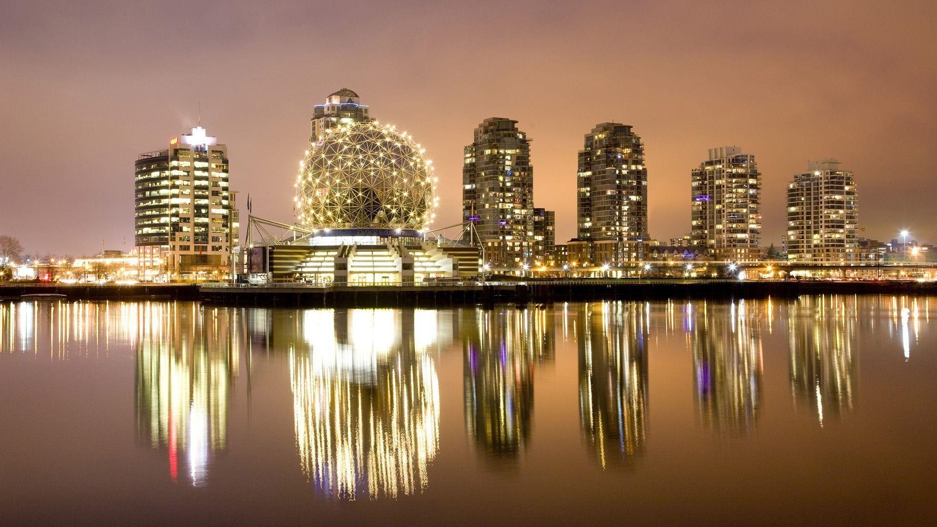 city architecture reflection downtown cityscape skyline skyscraper building dusk evening urban water sky modern sunset travel office illuminated business