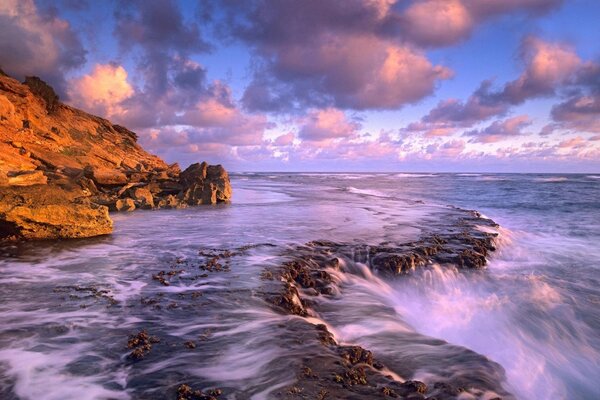 Sea waves crashing against the rocks