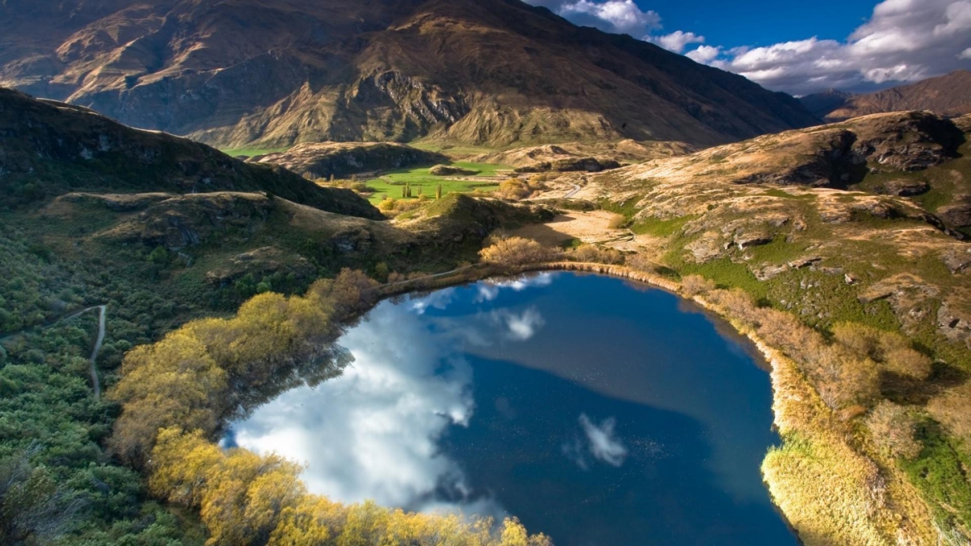 lake travel water landscape mountain nature outdoors scenic river sky valley daylight wood tree tourism environment island volcano