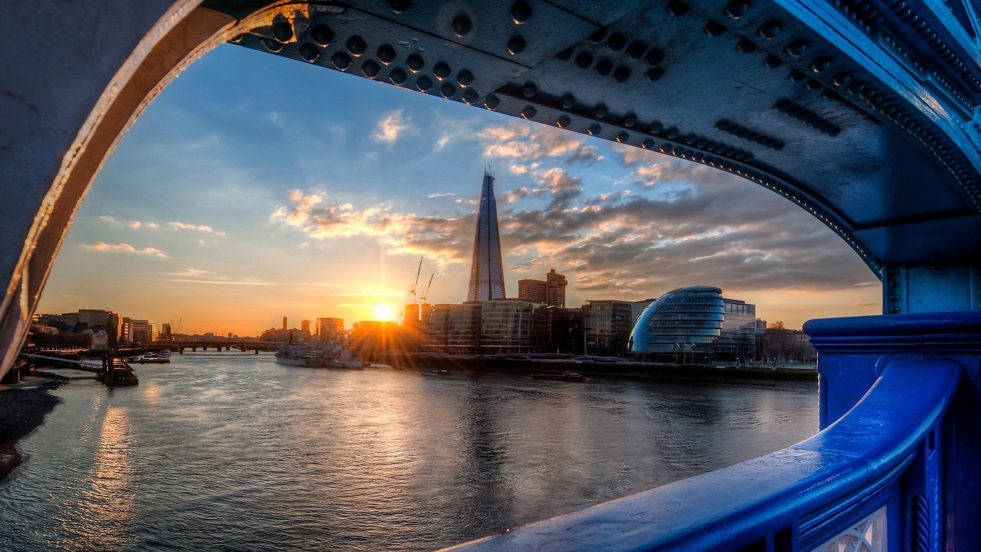 city and architecture bridge water travel architecture city river sky sunset building reflection transportation system outdoors light urban sea cityscape dusk evening pier