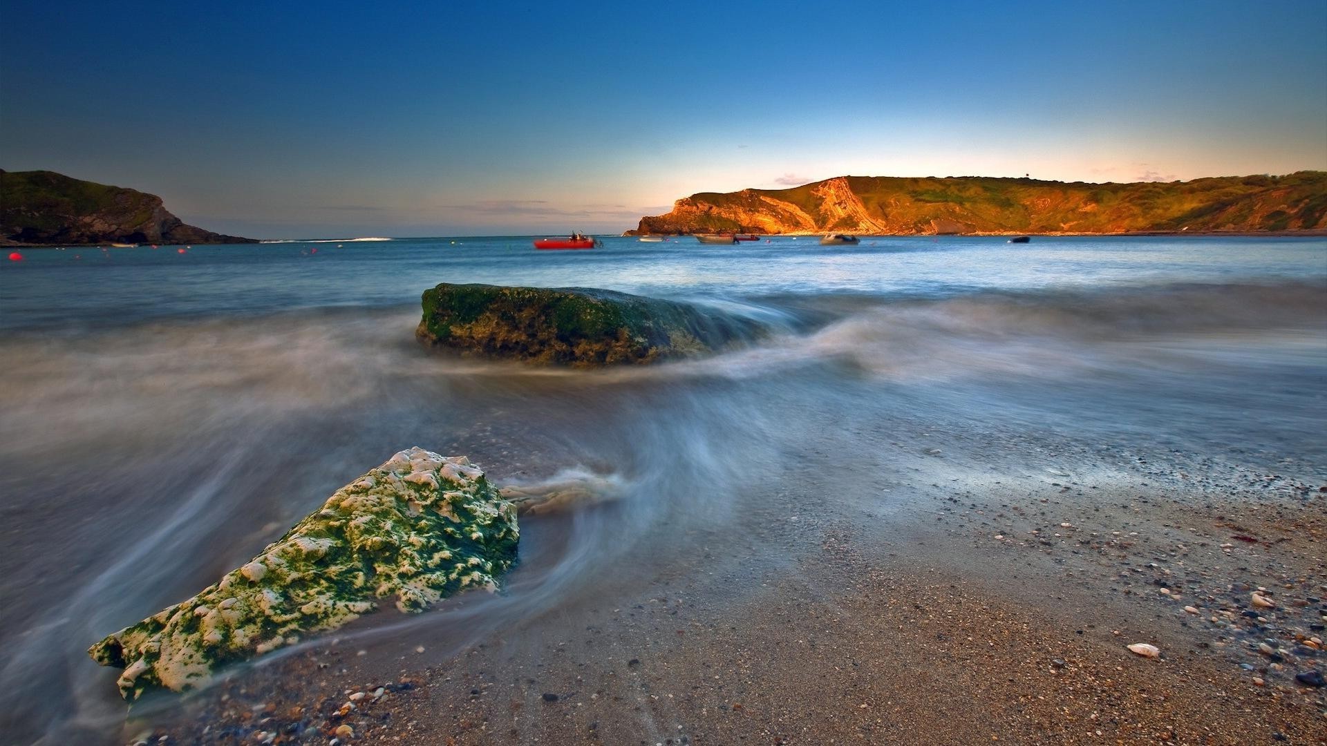 rochas pedregulhos e pedras pedregulhos e pedras praia água mar mar viagens pôr do sol paisagem oceano paisagem areia céu natureza surf ilha