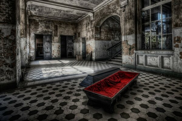 An empty coffin in an abandoned castle