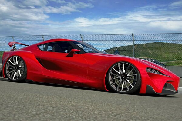 Voiture de couleur rouge sur les courses