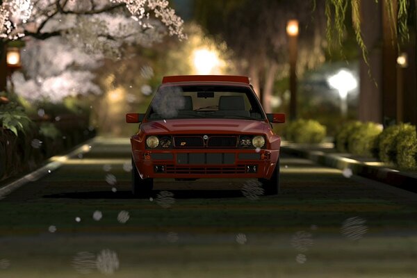 سيارة حمراء وأزهار الكرز