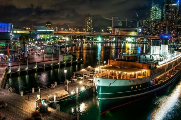 Titanic in the port in the night lights