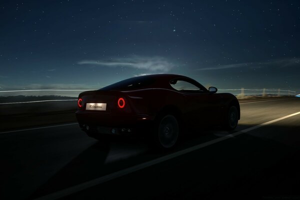 Coche rápido en la carretera nocturna