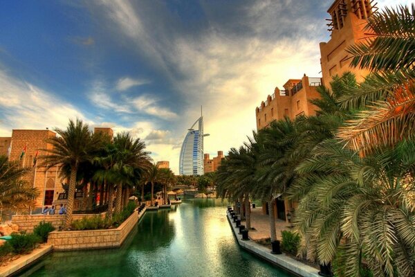 Modern architecture of the hotel on the background of palm trees