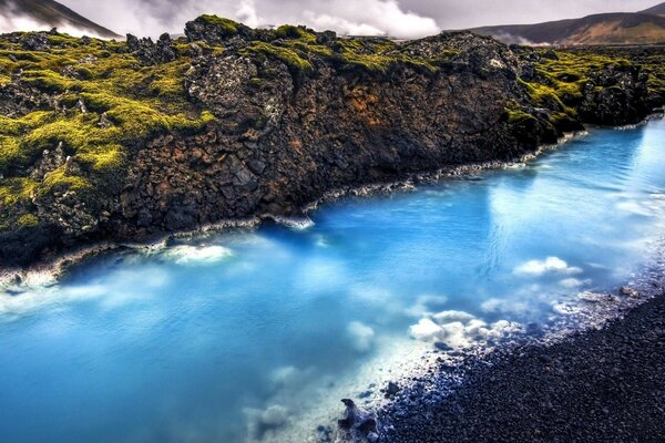 RIVER ALONG THE CLIFF AND FOG