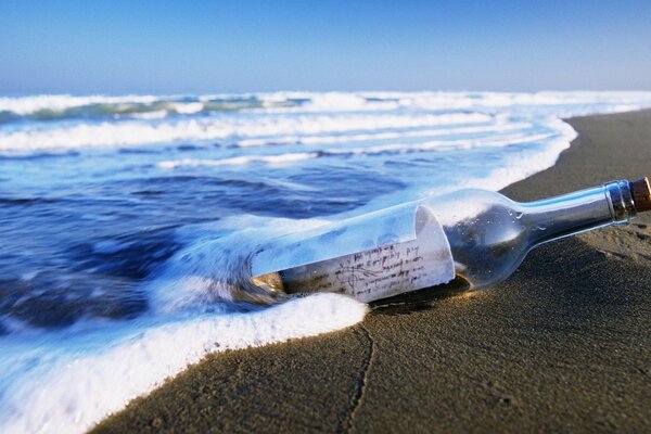 A note in a bottle washed ashore by the sea