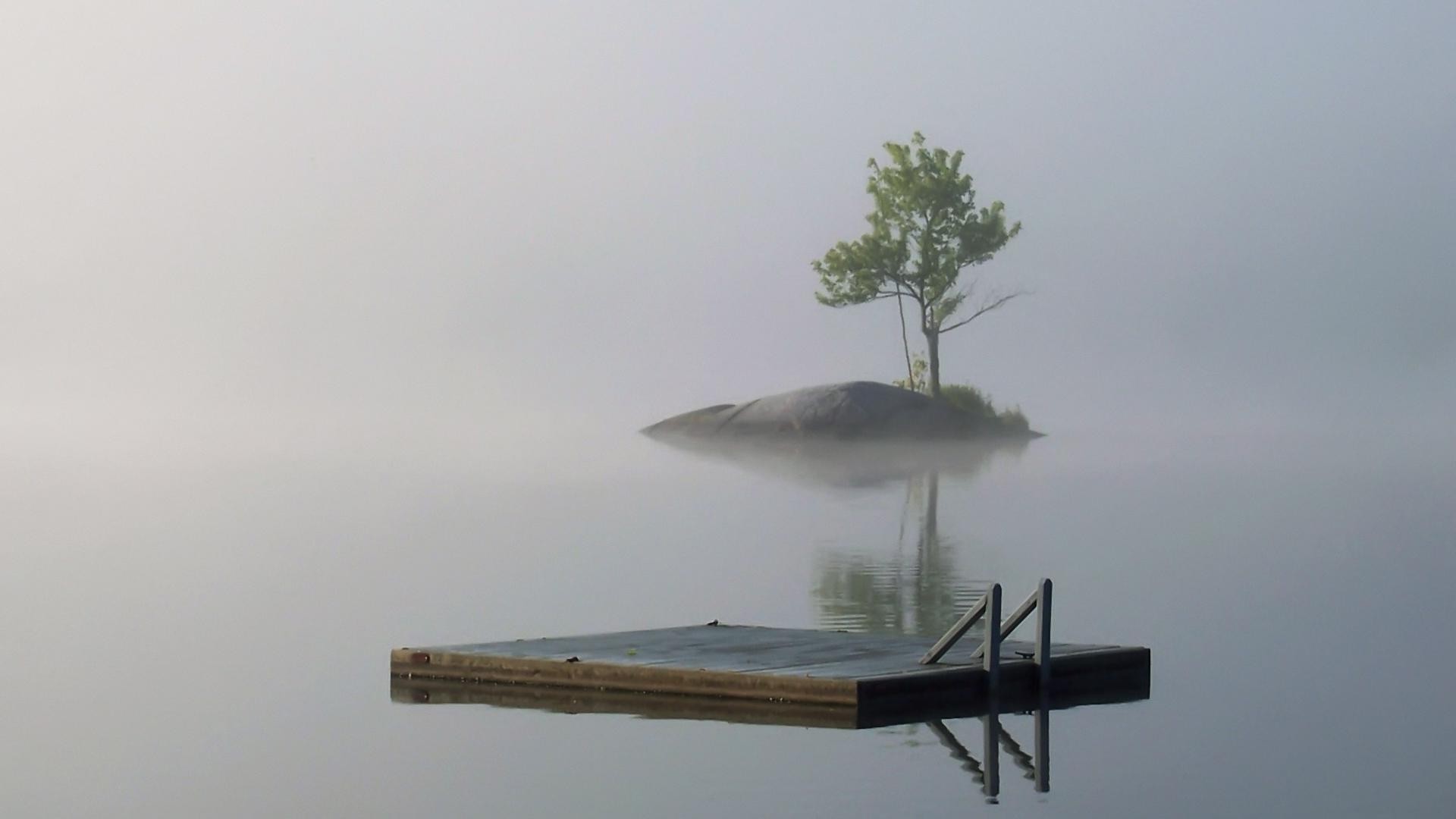 islands water fog daylight landscape outdoors seashore mist sea vehicle dawn beach ocean sky