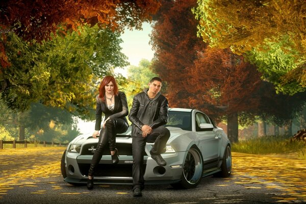 Beautiful couple with a car