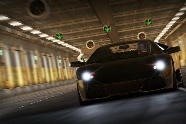 A sports car rides in a tunnel