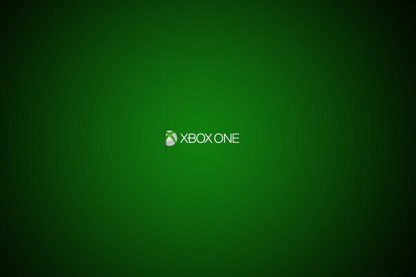 The logo of the Xbox One console in spotlight on a green background