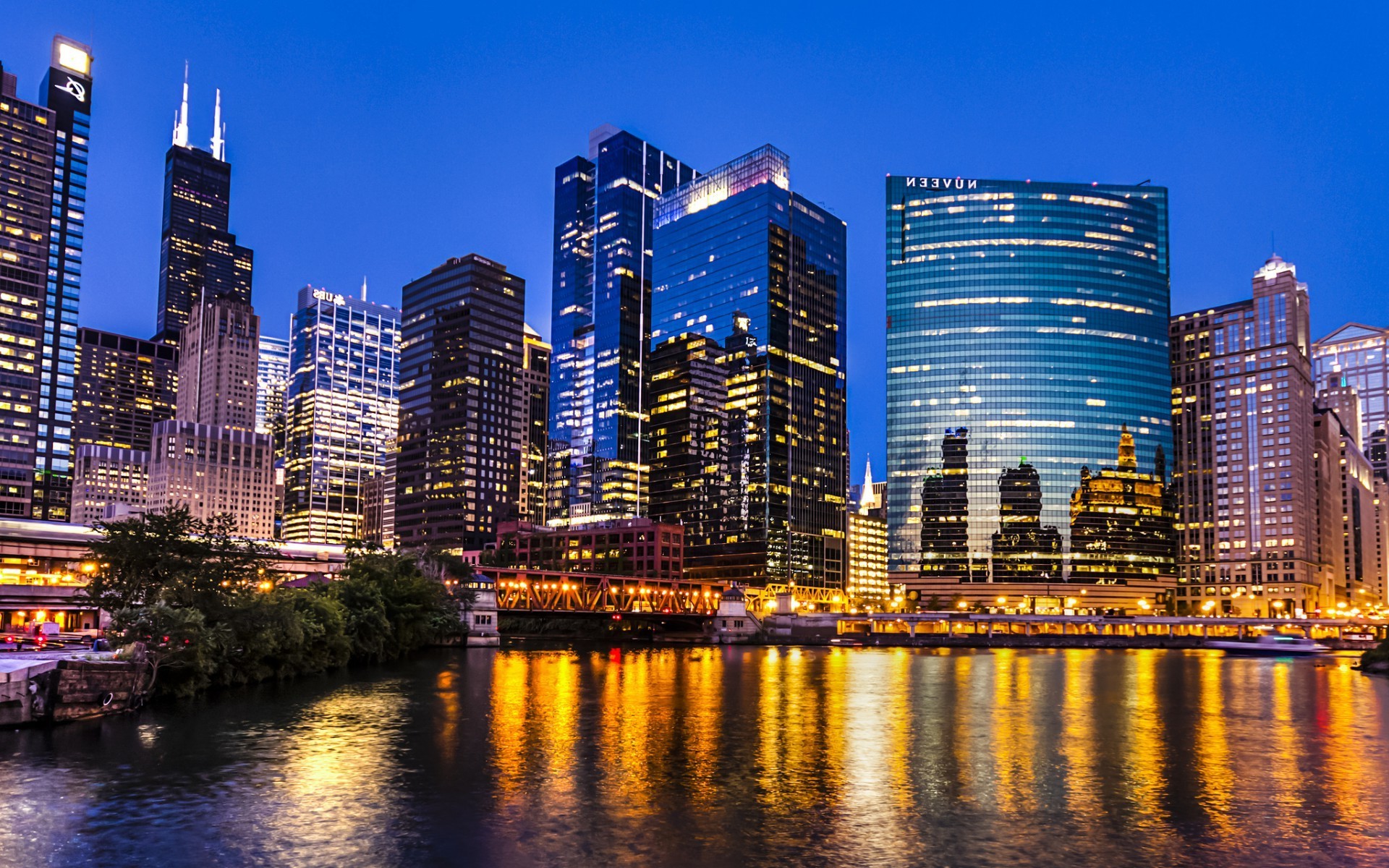 city architecture cityscape skyscraper downtown skyline office building dusk waterfront travel sky modern business urban river reflection tower finance evening