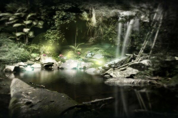 Waterfall in the evening in the light of the moon