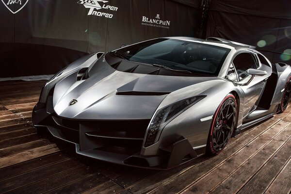 Sports supercar on a wooden floor background