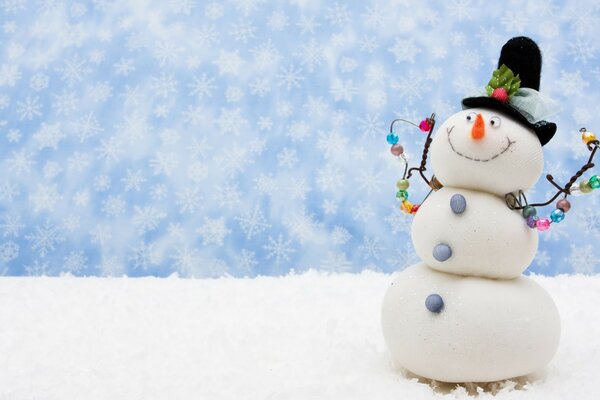 Funny snowman on a winter background