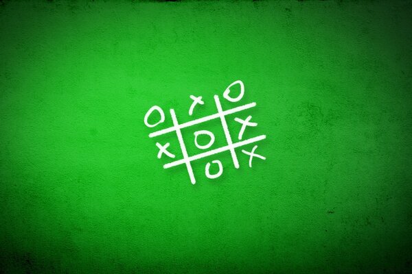 Fondo verde con el juego TIC TAC Toe