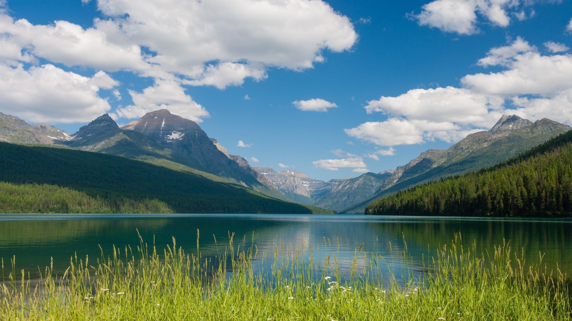 lake mountain landscape water travel nature outdoors sky snow reflection scenic wood valley summer lakeside grass