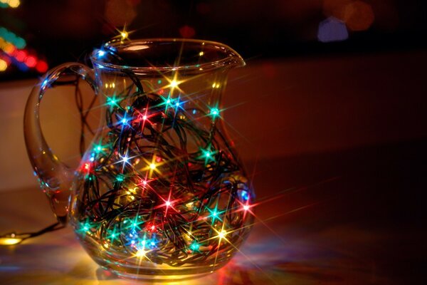 A jug with garlands inside for the New Year