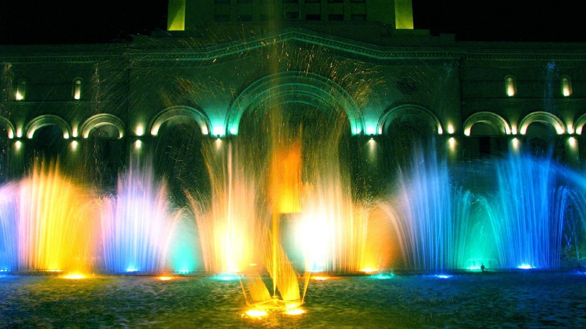 bright colors light water motion fountain illuminated art evening