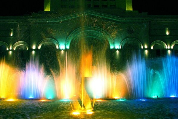 Bright fountains near the building