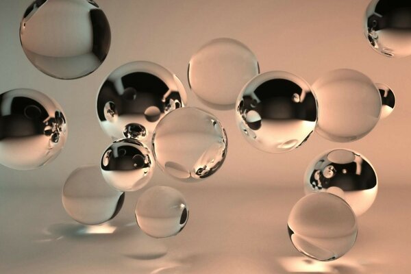 Bulles de liquide sur fond gris-beige