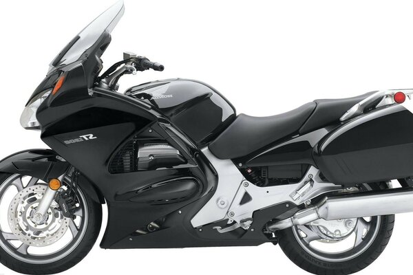 Moto de sport noir sur fond blanc