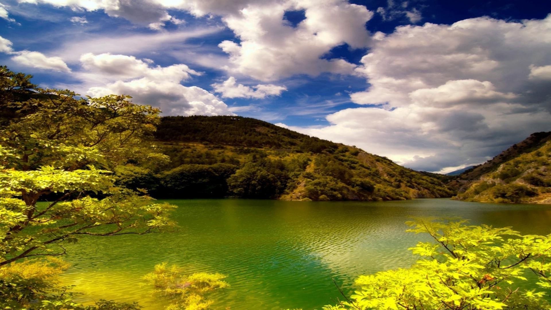 lake landscape water nature sky travel outdoors summer river fall mountain sunset wood reflection tree scenic fair weather grass