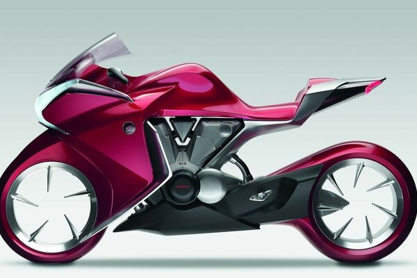 A glamorous crimson motorcycle and designed for glamorous girls