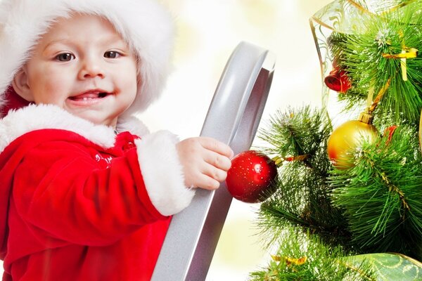 A kid in a Santa Claus costume