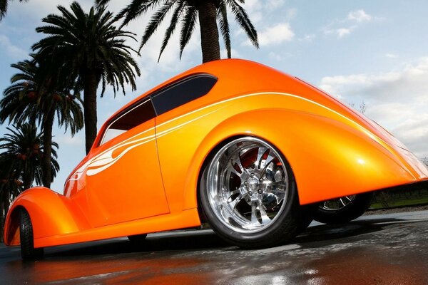 Bright orange car on wheels