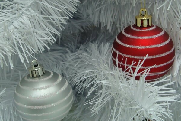 Christmas balls on a white Christmas tree